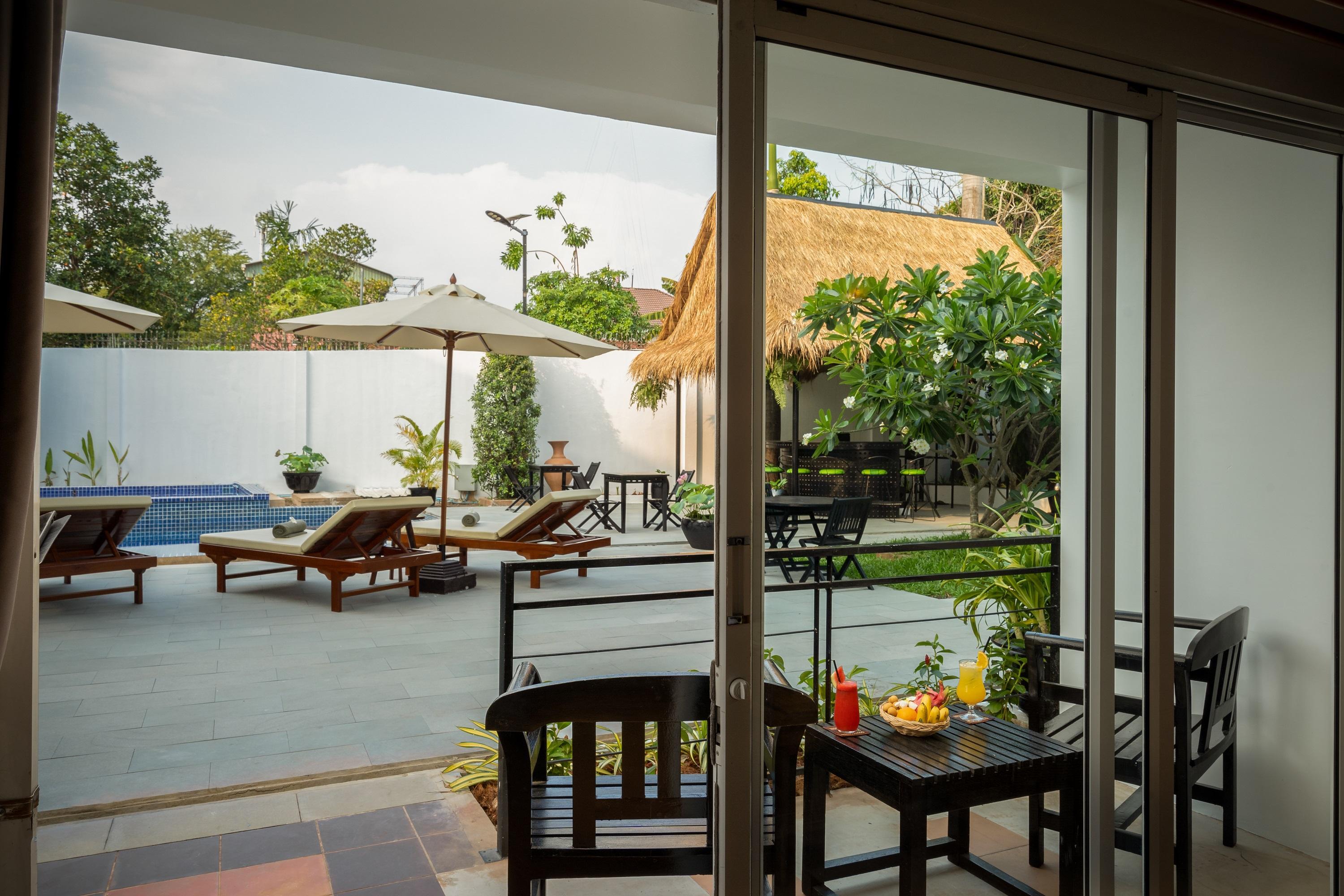Sala Siem Reap Hotel Εξωτερικό φωτογραφία A view of the pool at the hotel